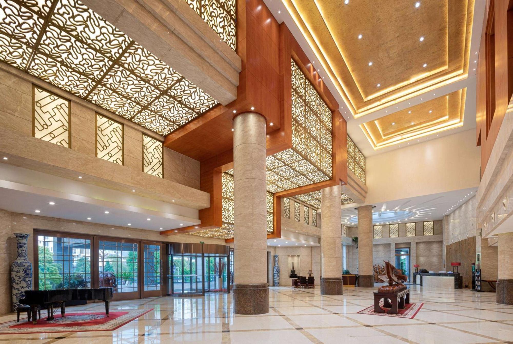 Ramada Plaza By Wyndham Chongqing West Hotel Exterior foto
